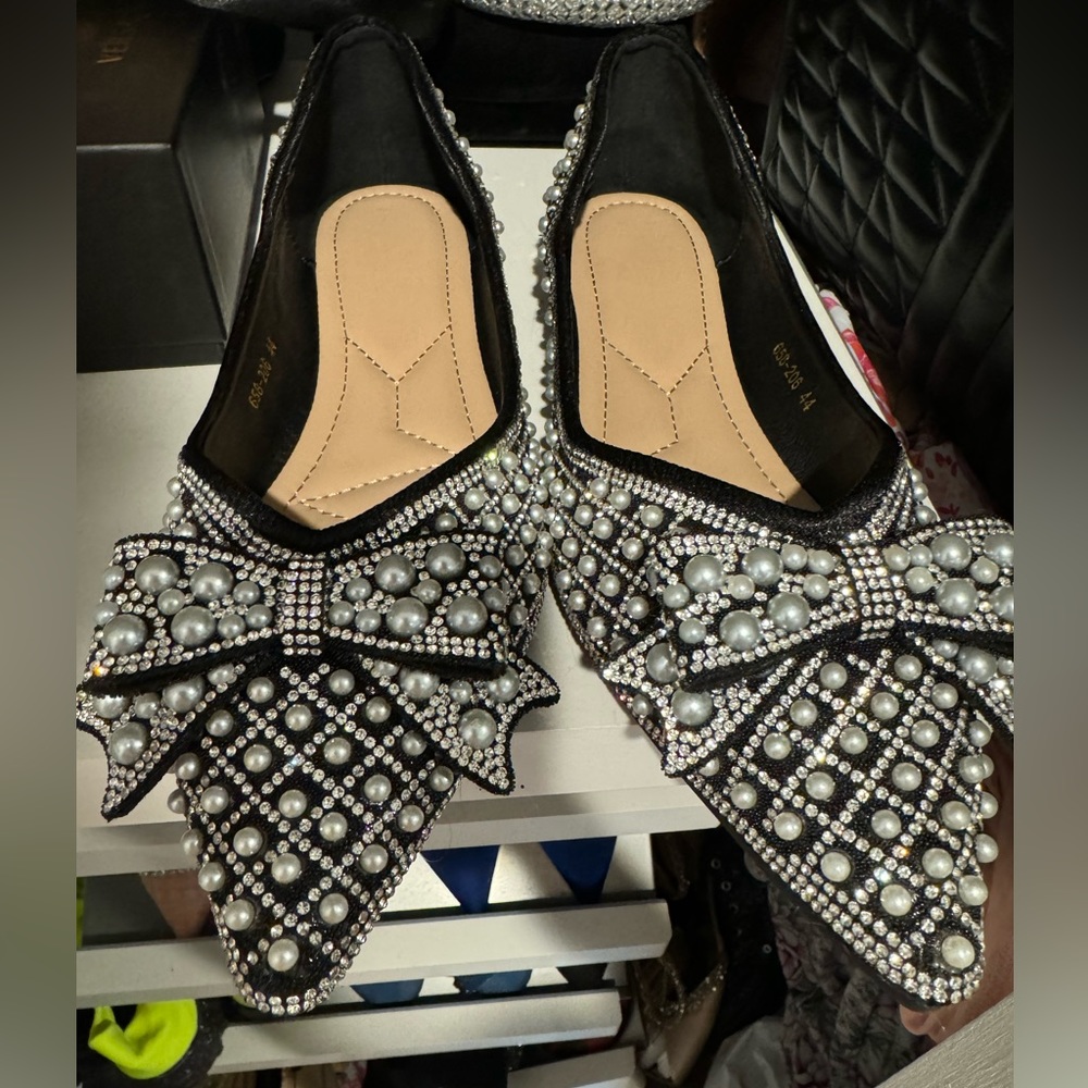 Comfortable bejeweled flats with red bottom